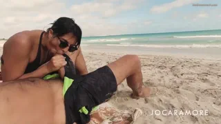 He cums in my mouth, right on the public beach